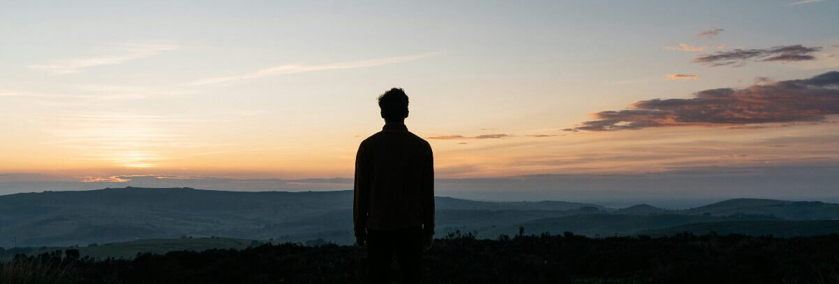 Morning light. A quiet view of through many hills, symbolizing personal growth over time.